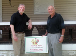 Jim Simmons, left, and Tom Egold are members of a group of former Catholic high school classmates who have formed Hearts and Hands of Indiana, a grassroots organization that offers hope and the opportunity for a new home to low-income families in Holy Trinity and St. Anthony parishes in Indianapolis. (Photo by John Shaughnessy)