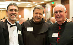 Richard Sontag, Jr., director of public relations for the Franciscan Foundation for the Holy Land (FFHL), left; Franciscan Father Peter Vasko, president of FFHL; and Msgr. Joseph Schaedel, pastor of St. Luke the Evangelist Parish in Indianapolis, were among the more than 200 guests who attended the Oct. 3 fundraising dinner for FFHL at the JW Marriott in Indianapolis. Msgr. Schaedel also served as master of ceremonies. (Submitted photo by Maureen Geis)