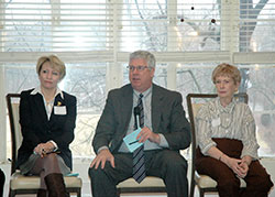 During a poverty summit at Marian University in Indianapolis on Feb. 24, University of Notre Dame professor William Evans answers a question while fellow panel members Sue Ellspermann, left, and Sheila Gilbert listen. Gilbert is the president of the national St. Vincent de Paul Society, and Ellspermann served as the lieutenant governor of Indiana before resigning on March 2. (Photo by John Shaughnessy)