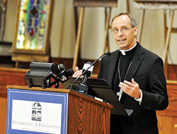Archbishop Charles C. Thompson speaks during a press conference on June 13 at the Archbishop Edward T. O’Meara Catholic Center in Indianapolis. Earlier in the day, Pope Francis had named the Evansville, Ind., bishop as the seventh archbishop of Indianapolis, succeeding Cardinal Joseph W. Tobin, who was appointed to lead the Archdiocese of Newark, N.J., last November. (File photo by Sean Gallagher)