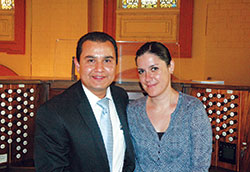 Hector and Erika Salcedo pose for a photo in the choir loft of SS. Peter and Paul Cathedral in Indianapolis on July 28, a day when Hector played the cathedral’s pipe organ and Erika sang in the choir during the installation Mass of Archbishop Charles C. Thompson. (Photo by John Shaughnessy)