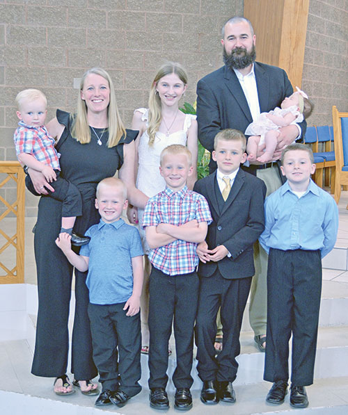 The Verhiley family poses on May 5 at St. Jude Church in Indianapolis. They are, from left, in the front row, Damian, Louis, Rocco and John Paul. In the back row, James, Meagan, Erin, Patrick and Teresa Clare. (Submitted photo)